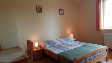 Фото номера Трехместный номер Фермерские дома Dzika Zagroda г. Dziemiany 4